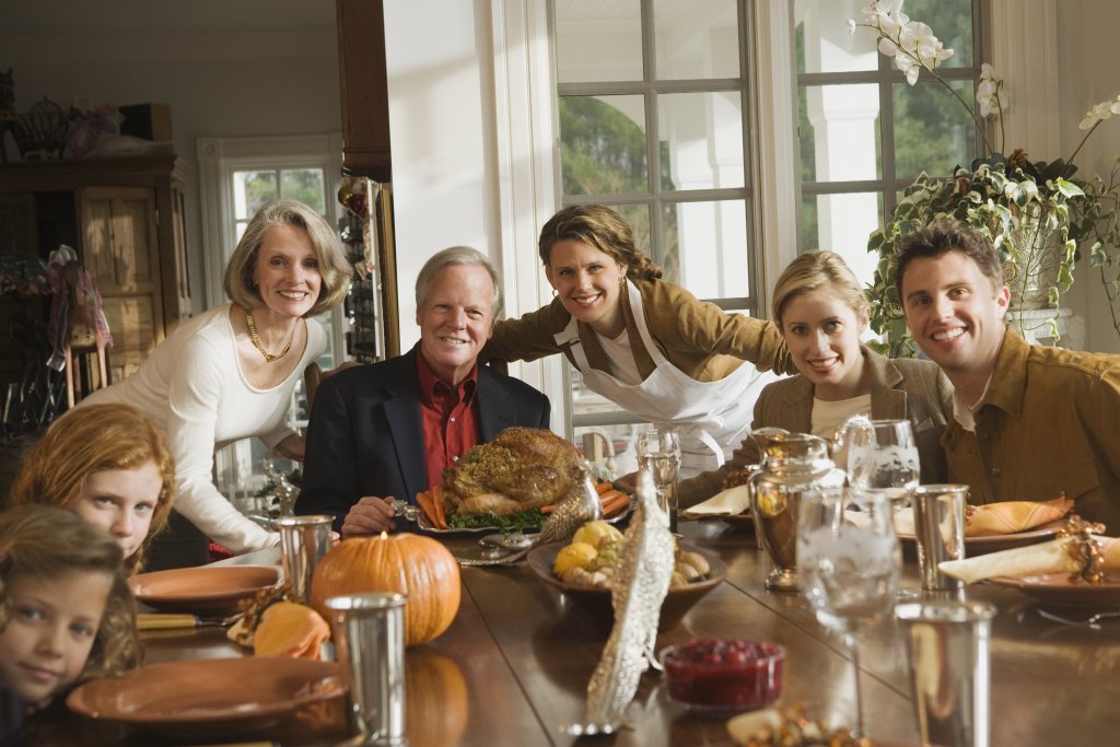 large family with turkey dinner