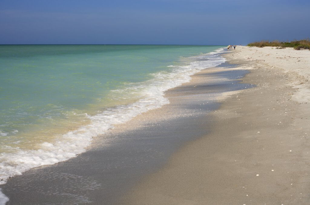 Beautiful beach on Sanibel Island, Florida. The Gulf Coast beach is famous for sea shell collecting.